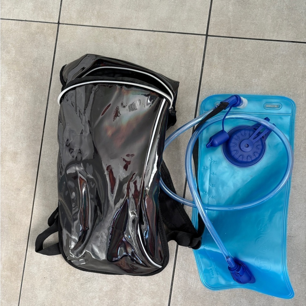 Shiny Black Hydration Backpack never used